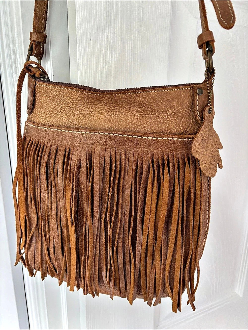 Roots Fringe Leather Crossbody Bag in Brown